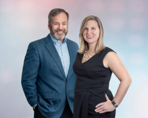 A man and woman posing for a picture.